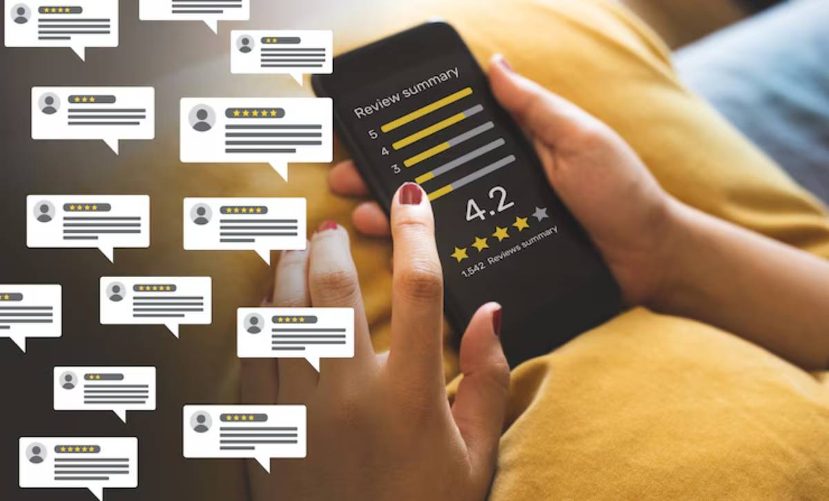 Person holding a smartphone displaying a review summary with a 4.2 rating and various comment bubbles in the background.