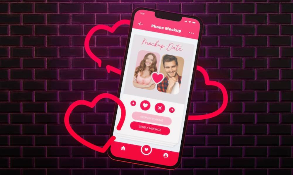 A phone mockup displaying a dating app interface with heart graphics and options to keep playing or send a message against a dark brick background.